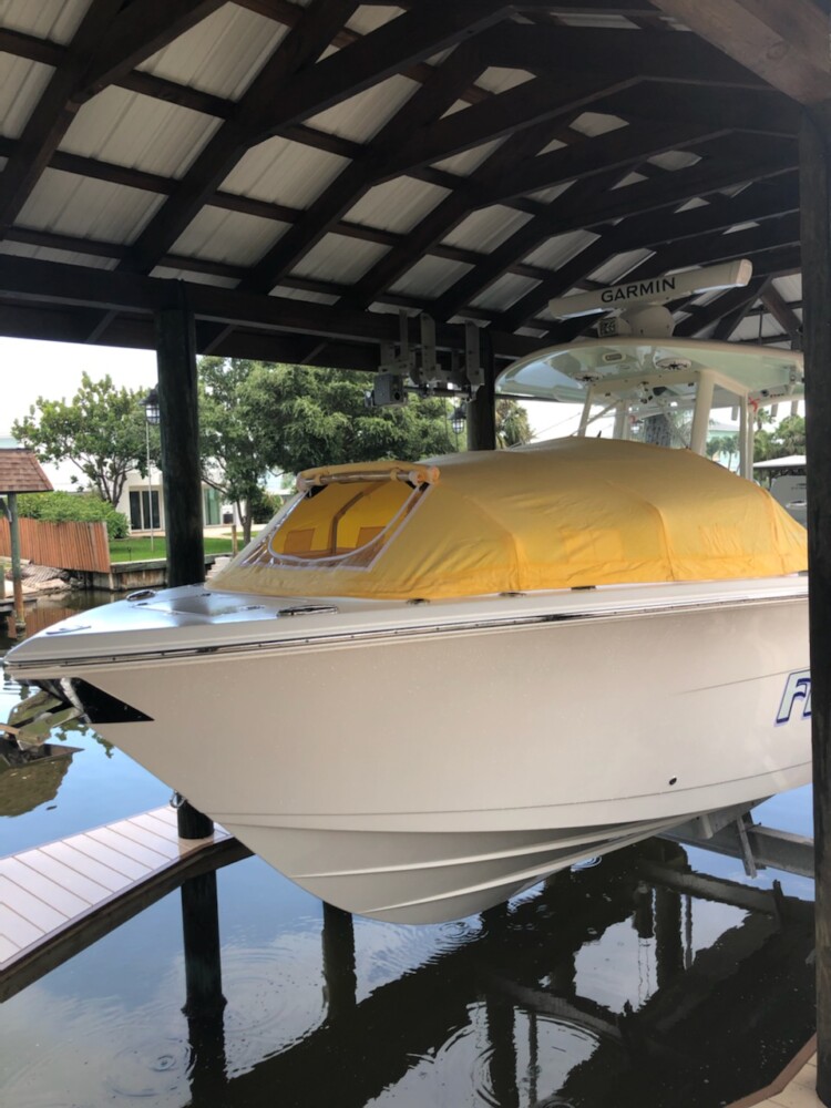 https://marinecanopy.com/wp-content/uploads/2022/07/Cobia-280-fishing-boat-shade-camping-tent-boat-trip-Cobia-296-CC-Cobia-274-CC-Cobia-277-Cc-boating-with-kids-e1657892885610.jpg