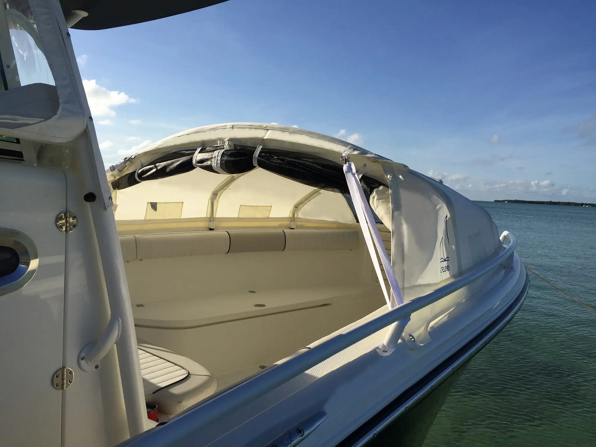 Boat's canvas top and seating area.